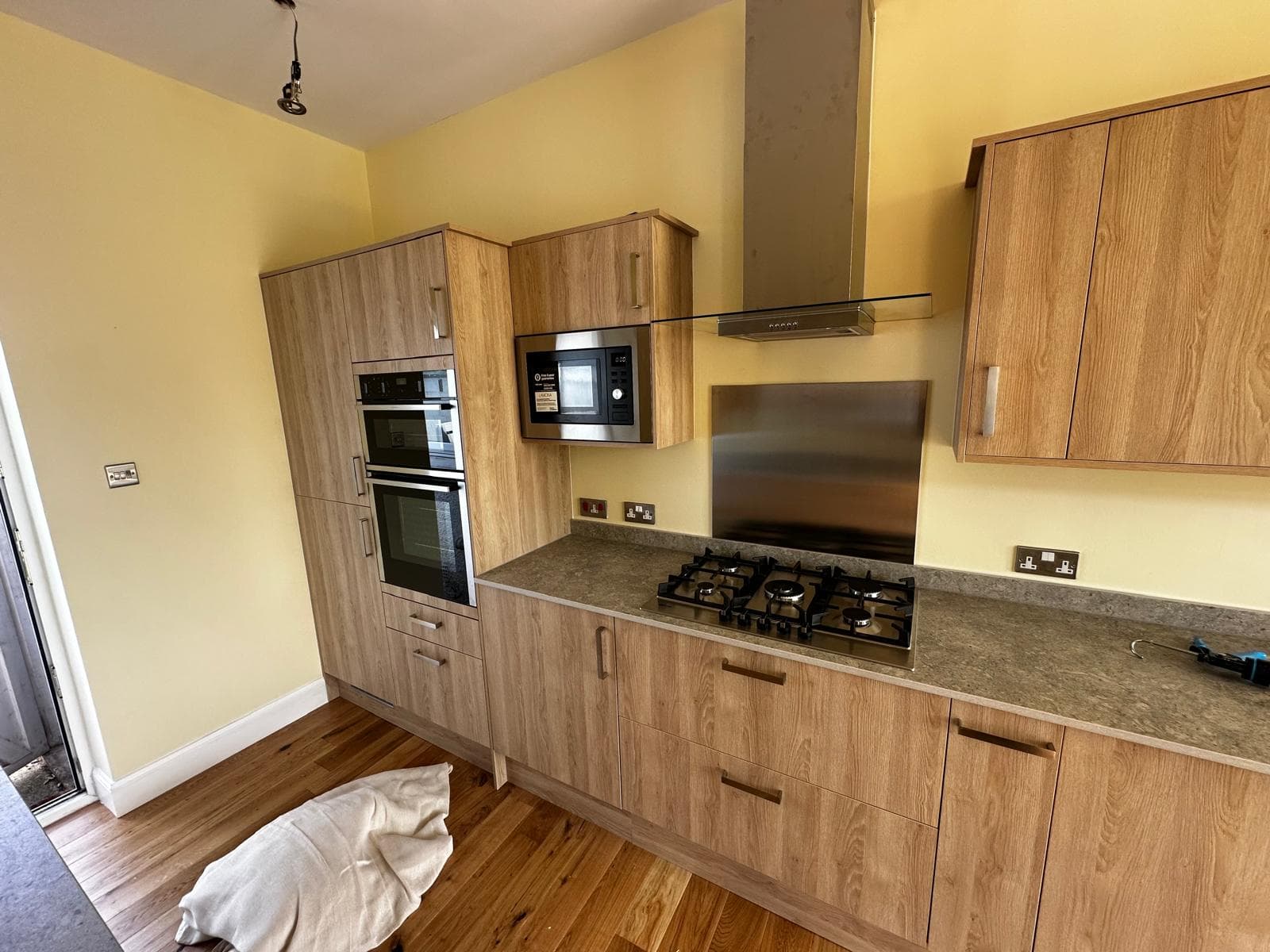 Kitchen with double oven and gas hob
