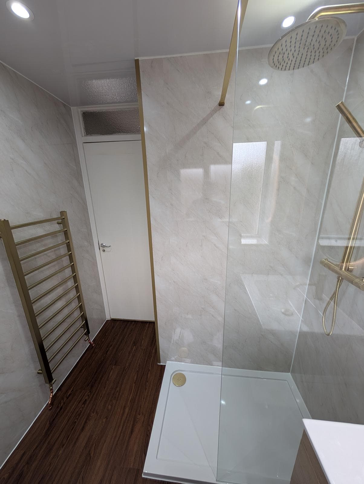 Brushed brass walk-in shower